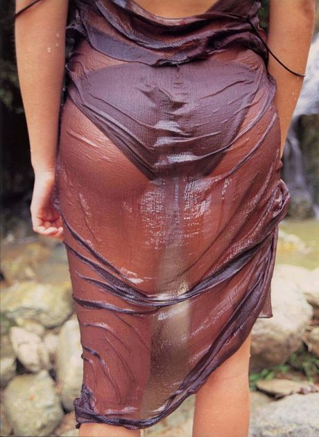 Voluptuous asian hottie at the beach in her skimpy little bikinis