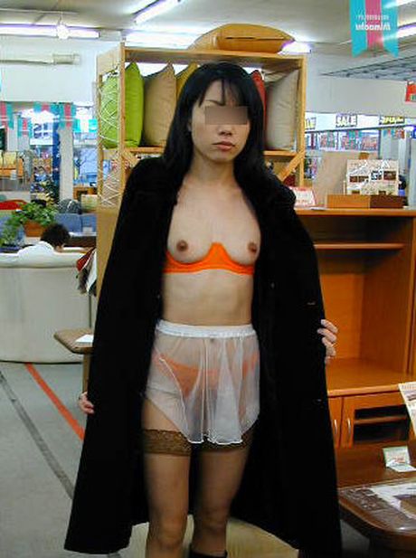 Asian amateur teen strips and shows her curves in the public place