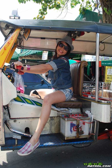 Asian teen Som strips and shows her tiny tits and pussy in public