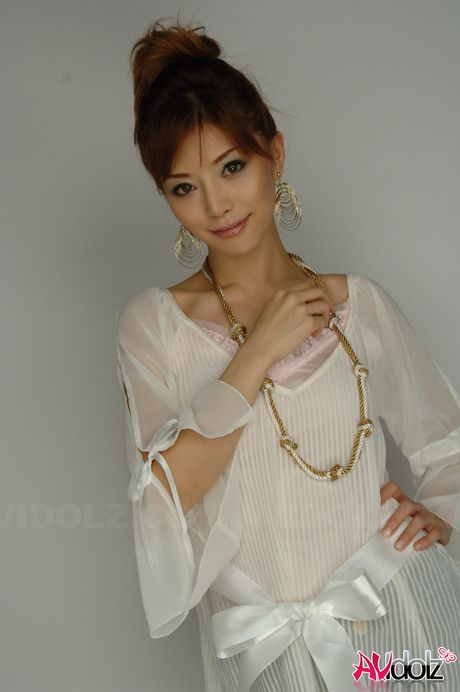 Stunning Asian teen Akane Hotaru strips and shows her perfect tits and ass