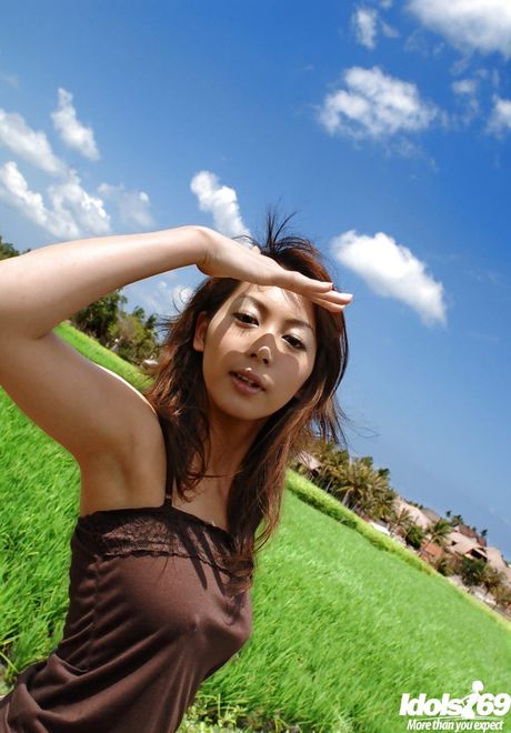 Slender japanese babe Honoka in skirt denudes small tits and spreads her legs