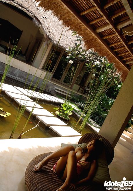 Slender japanese babe Honoka in skirt denudes small tits and spreads her legs