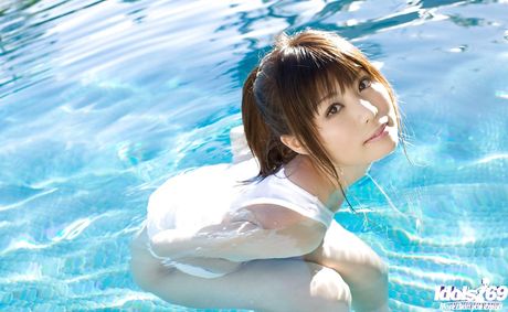 Adorable japanese cutie Aya Hirai in fancy skirt showing her beauty near the pool